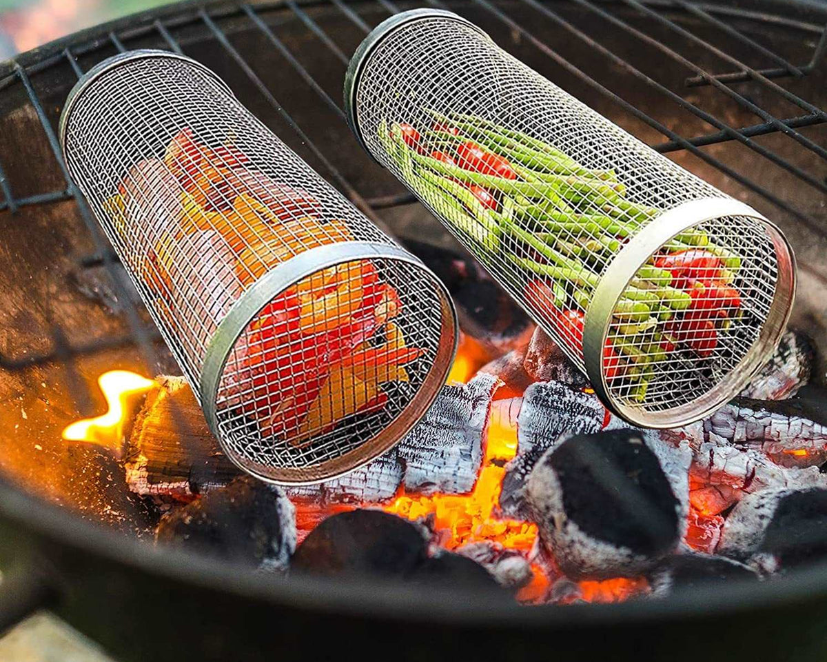 BBQ rack cooking grill with outdoor rolling grilling basket made of stainless steel on open flame.