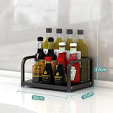 Kitchen storage rack with seasoning bottles and olive oil, stainless steel finish, 2-tier design, 30x17x17 cm dimensions.