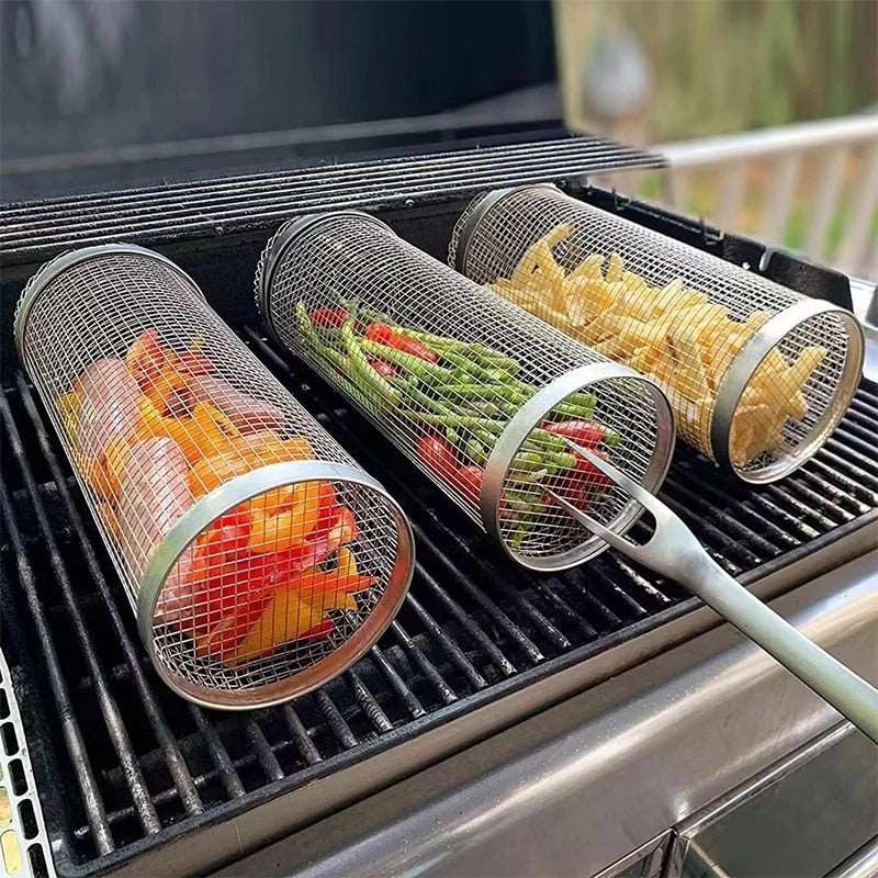 Stainless steel grill baskets with assorted vegetables, perfect for outdoor BBQ cooking.