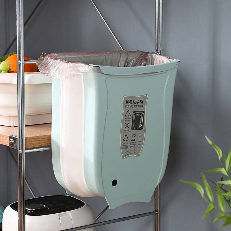 Wall mounted foldable waste bin for kitchen cabinet door; hanging trash bin suitable for bathrooms, foldable design for space-saving storage.