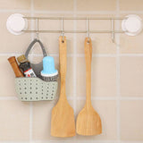 Adjustable plastic storage drain basket sink holder for kitchen organization.