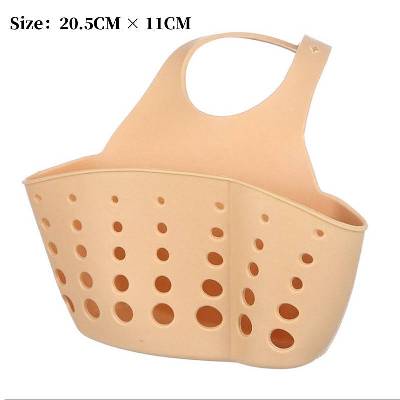 Adjustable plastic storage drain basket sink holder with holes for liquid drainage.