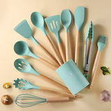 12-piece wooden handle silicone kitchen utensils set with storage bucket in light green, featuring non-stick and heat-resistant spatula and spoon.