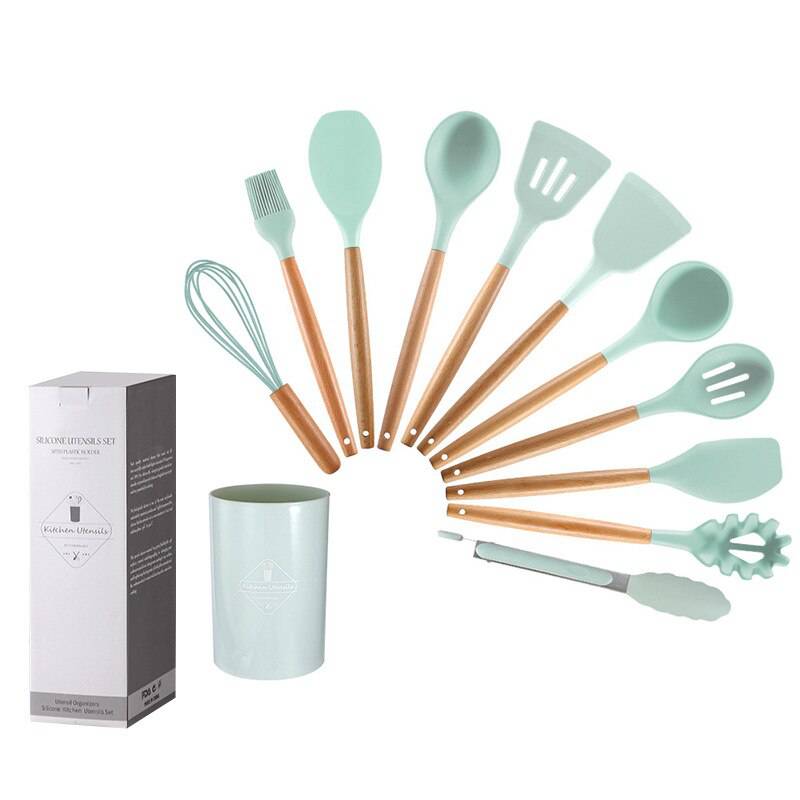 12-piece wooden handle silicone kitchen utensils set with storage bucket in light green, featuring high temperature resistance and non-stick properties.