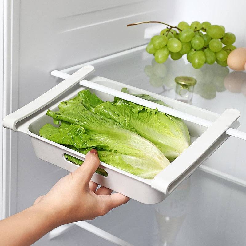 Hanging refrigerator drawer storage box with lettuce inside, suitable for eggs, fruits, and vegetables.