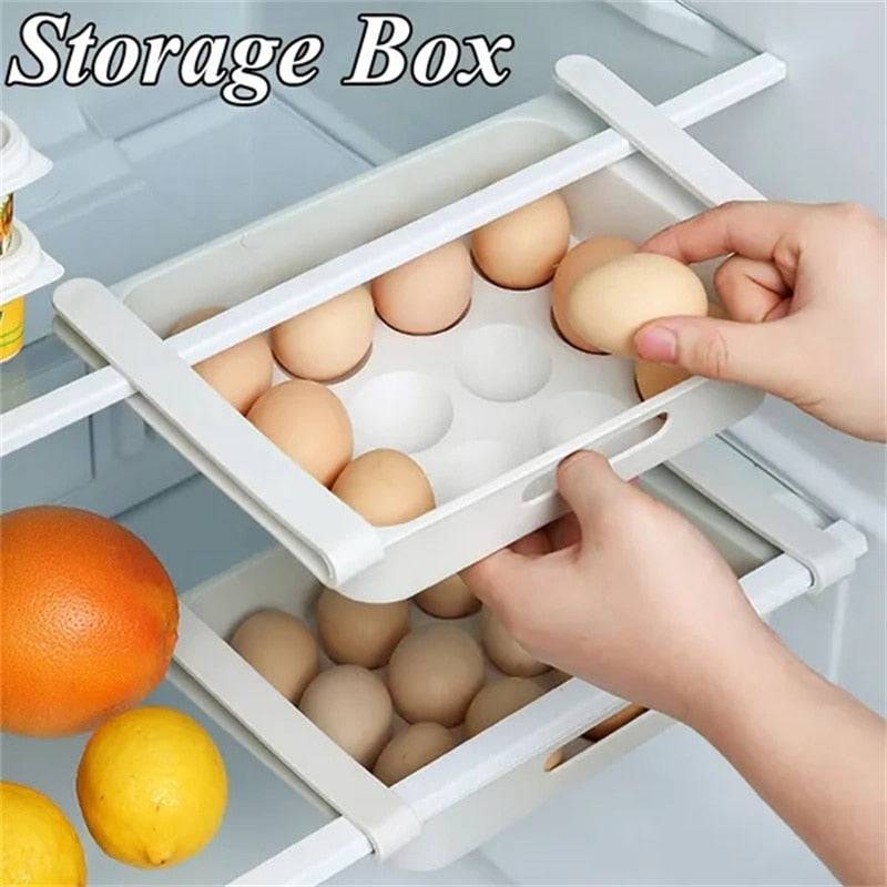 Hanging refrigerator drawer storage box for eggs and vegetables.