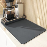 Large kitchen super absorbent draining drying mat with coffee maker on countertop.