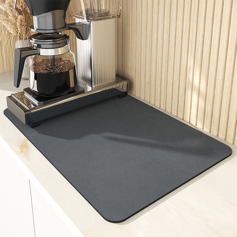 Large kitchen super absorbent draining drying mat with coffee maker on countertop.