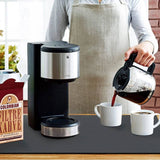 Large kitchen super absorbent draining drying mat under coffee maker and cups on countertop.