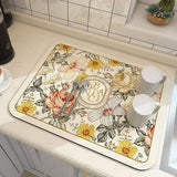 Large kitchen super absorbent draining drying mat with floral design on countertop.