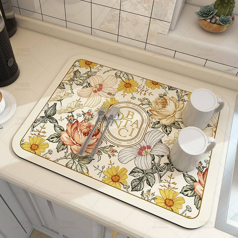Large kitchen super absorbent draining drying mat with floral design on countertop.