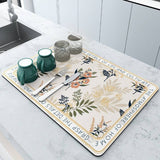 Large kitchen super absorbent draining drying mat with floral design on countertop.