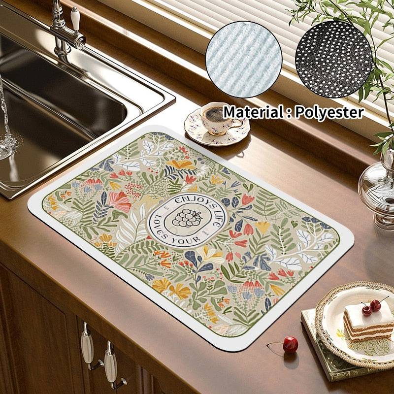 Absorbent kitchen dish drying mat and drain pad with floral design, made of durable crystal velvet, ideal for keeping counters clean and tidy.