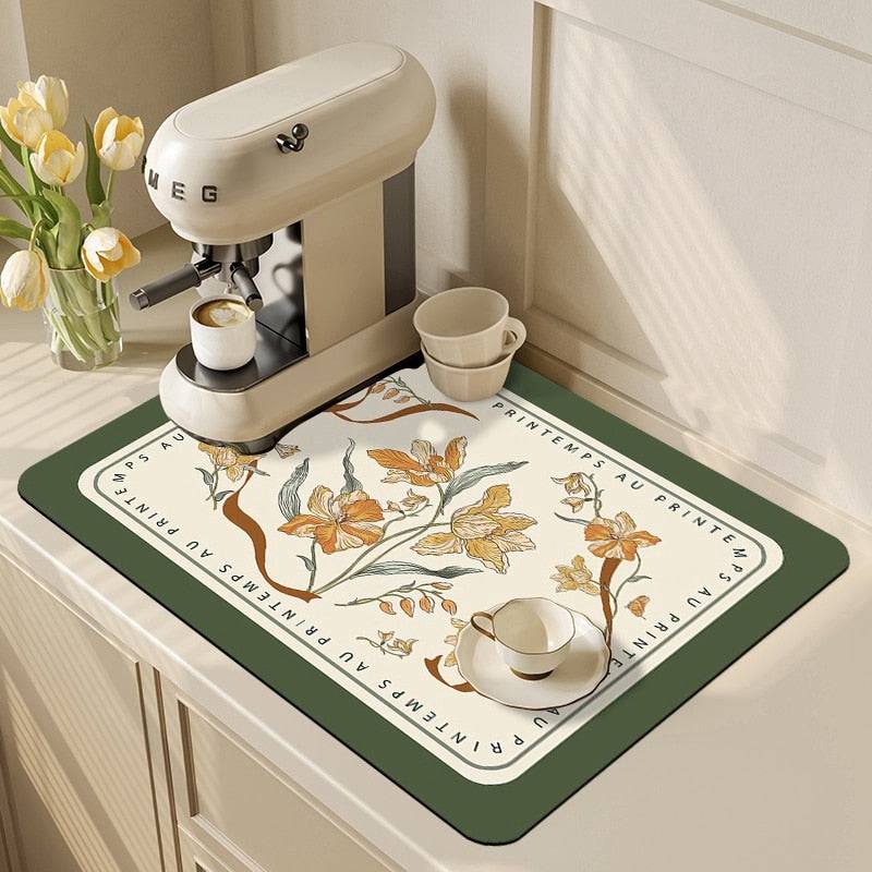 Kitchen dish drying mat and absorbent drain pad with floral design on countertop, featuring crystal velvet material for durability and non-slip surface.