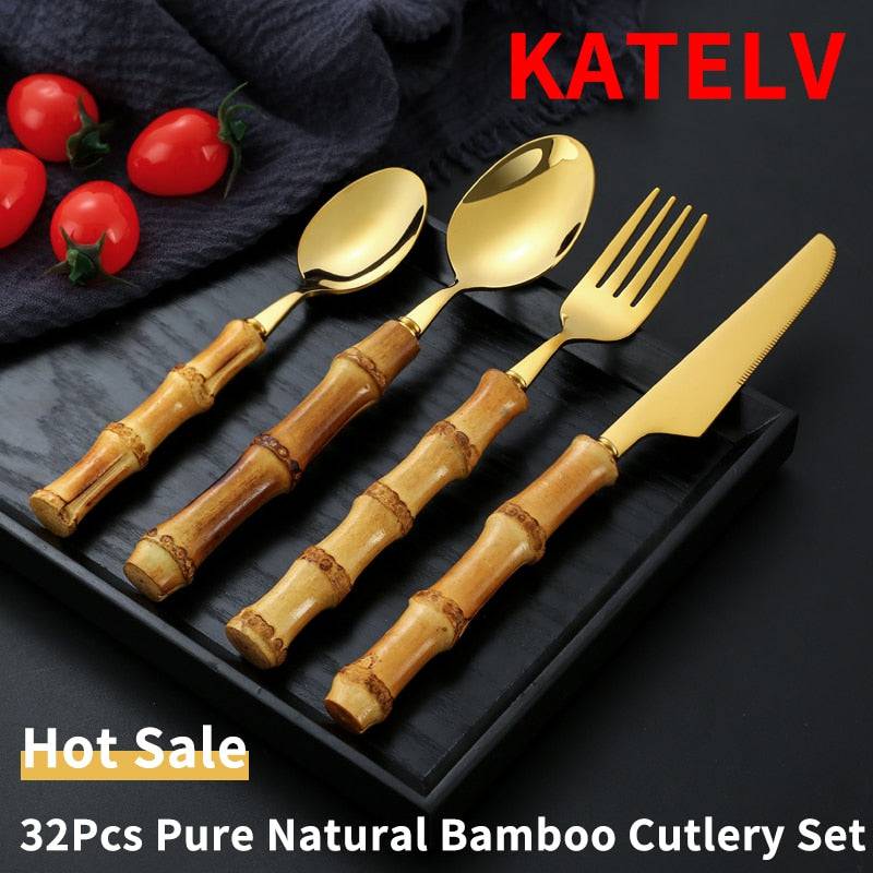32-piece bamboo handle stainless steel flatware set with gold finish, including knife, fork, and spoons.