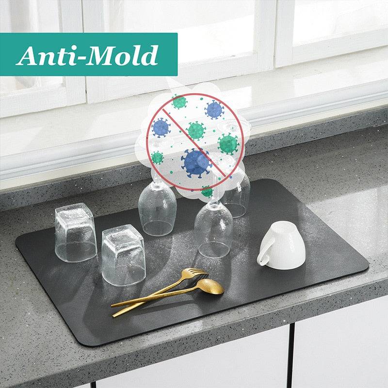 Super Absorbent Drainer Mats on countertop with glasses and utensils, featuring anti-mold properties.