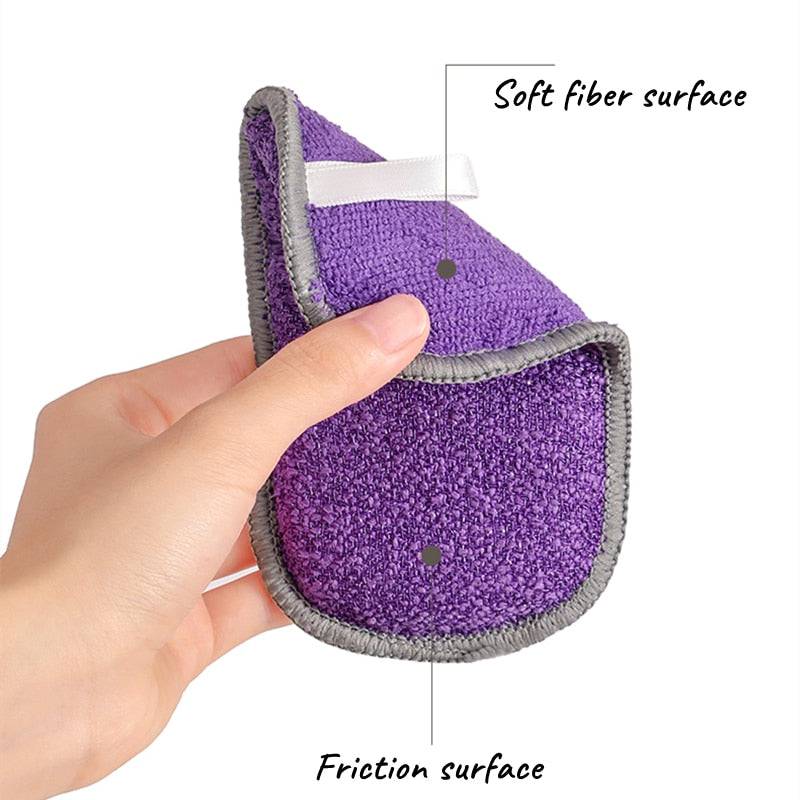 Hand holding a purple Reusable Magic Sponge Double Sided Eraser for kitchen cleaning.