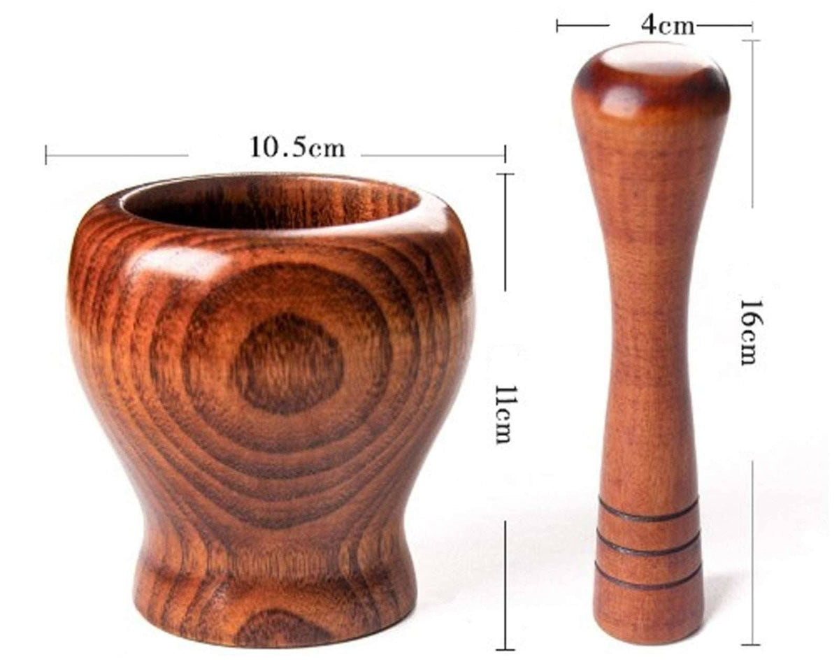 Bamboo wooden mortar and pestle set for grinding spices and herbs.
