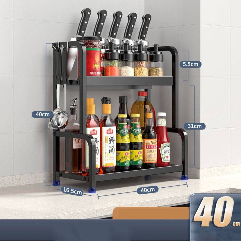 Stainless steel kitchen storage rack with 2 tiers, holding knives, spice jars, and condiments, featuring removable hooks for utensils.