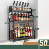 Stainless steel kitchen storage rack with three tiers for seasoning jars, chopsticks, knives, and bottles.