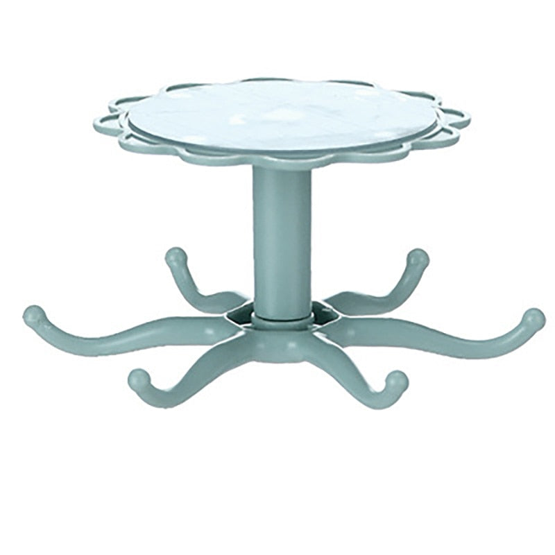 Wall-mounted kitchenware storage rack with flower design, 360-degree rotary hooks, and eco-friendly ABS material.