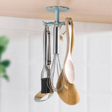 Wall-mounted kitchen storage rack with rotary hook holding kitchen utensils.