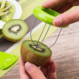 Kiwi Cutter Kitchen Detachable Creative Fruit Peeler slicing a kiwi.