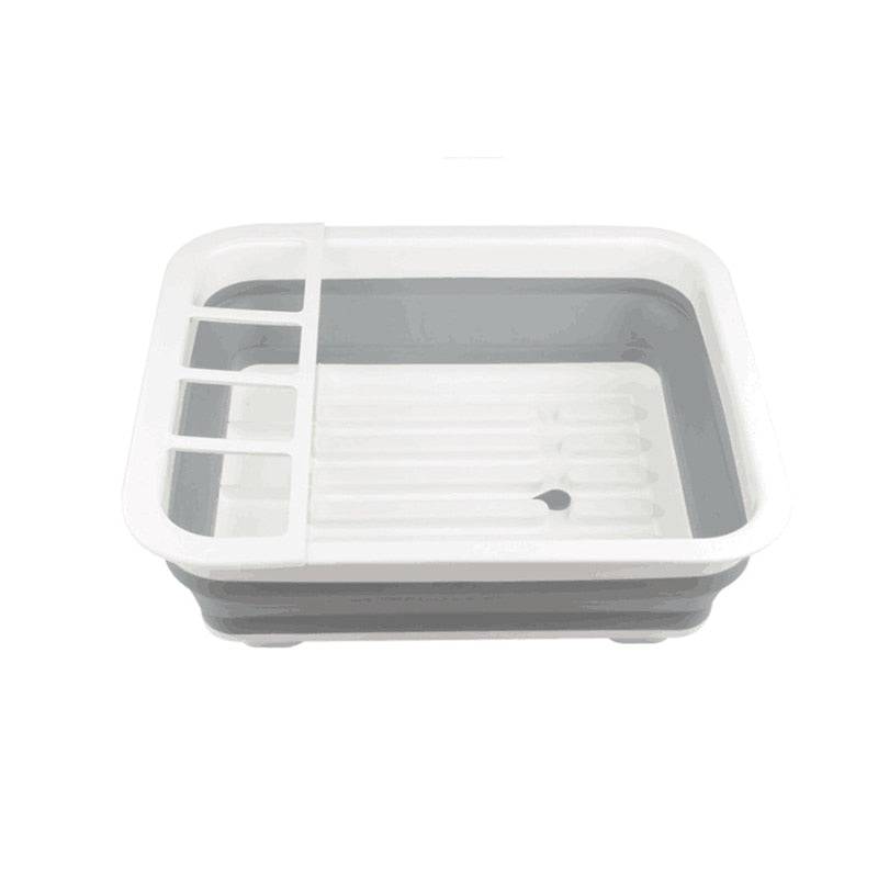 Foldable dish rack kitchen drainer tool with white and gray design, flexible material, and separate utensil area.