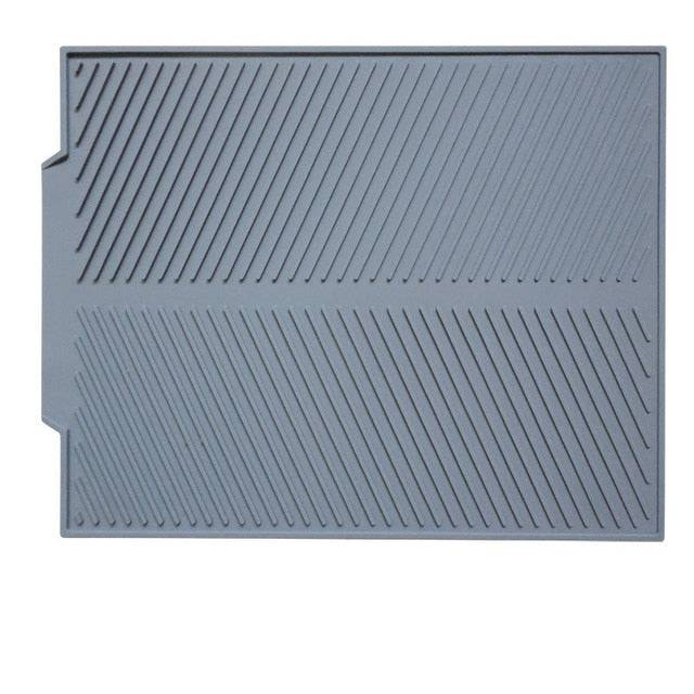 Foldable insulated soft rubber sink mat in gray, anti-slip, kitchen use.