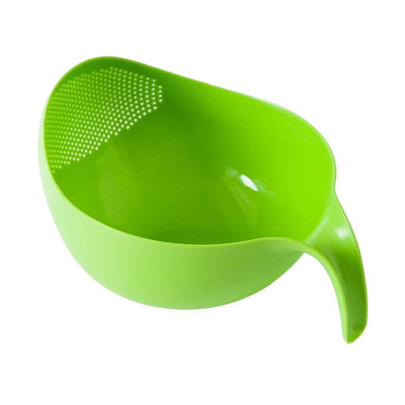 Green rice washer and quinoa strainer with handle, kitchen tool for cleaning vegetables and fruits.