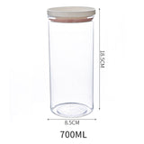 Transparent 700ml kitchen storage container with sealed ring, measuring 18.5cm in height and 8.5cm in diameter, ideal for food preservation.