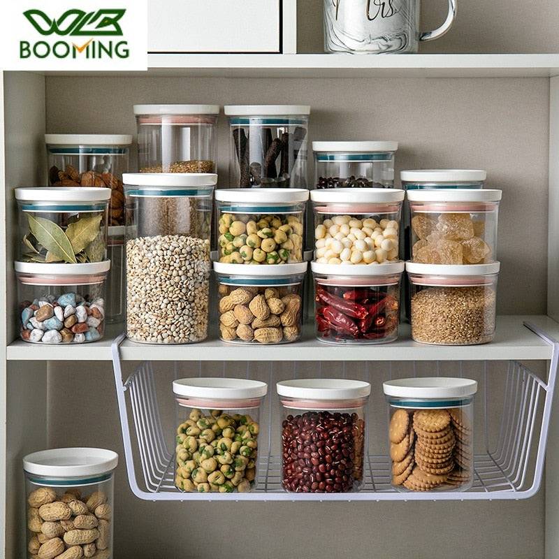 Transparent kitchen storage canisters with sealed rings, ideal for food organization and freshness.