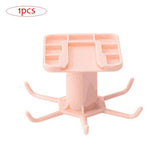 Kitchen OrCabinet Organizer Hook in pink with rotatable hooks for utensil storage.