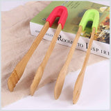 Bamboo Food Toaster Tongs Salad Cake Snack Clip Grip Silicone Handle B100% brand new & high quality!Practical kitchen tongs, applicable for serving bread, toast, dessert, salad, fruit, etc.Specifications:Material: Bamboo +SiliconeCTheWellBeing1Bamboo Food Toaster Tongs Salad Cake Snack Clip Grip Silicone Handle Bake Bread BBQ Tongs ClampCulinaryWellBeing