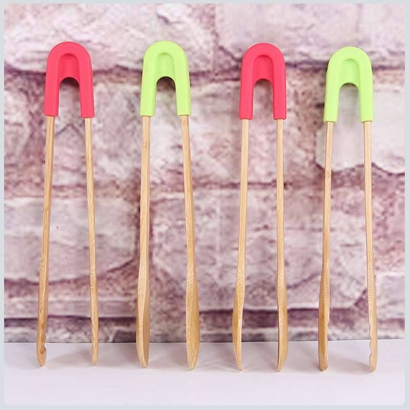 Bamboo Food Toaster Tongs Salad Cake Snack Clip Grip Silicone Handle B100% brand new &amp; high quality!Practical kitchen tongs, applicable for serving bread, toast, dessert, salad, fruit, etc.Specifications:Material: Bamboo +SiliconeCTheWellBeing1Bamboo Food Toaster Tongs Salad Cake Snack Clip Grip Silicone Handle Bake Bread BBQ Tongs ClampCulinaryWellBeing