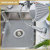 Silicone sink protector mat in stainless steel sink for kitchen use, heat resistant, non-rusting, 34x29cm.