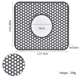 Silicone sink protector mat with honeycomb design, measuring 31.5cm x 26.5cm, weight 210g.