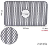Silicone sink protector mat with grid pattern for kitchen sinks, 35.5x66.5cm size, heat resistant and durable.