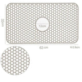 Silicone kitchen sink protector mat with honeycomb pattern, 63x33cm dimensions, heat resistant.