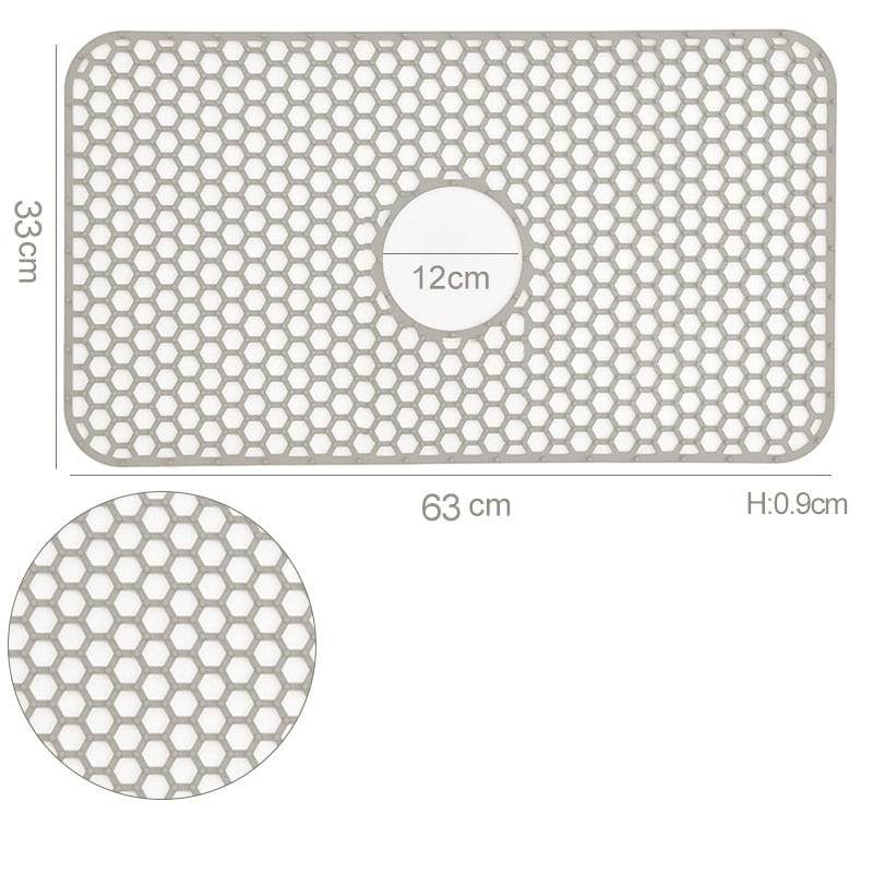 Silicone kitchen sink protector mat with honeycomb pattern, 63x33cm dimensions, heat resistant.