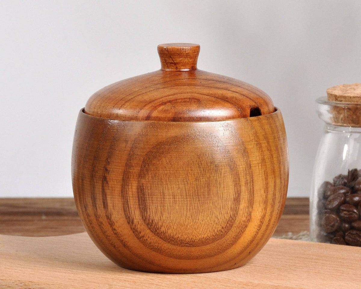 Wooden retro seasoning pot with lid, creative design for kitchen use.