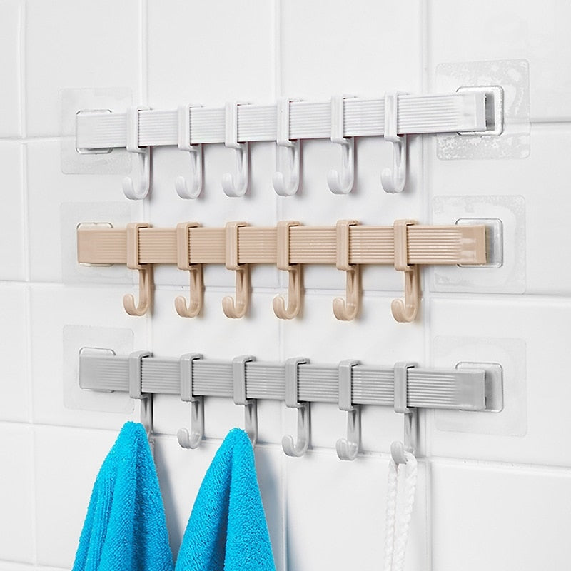 Multifunction Storage Hook 6 Hooks on wall, holding towels in white, beige, and gray colors.