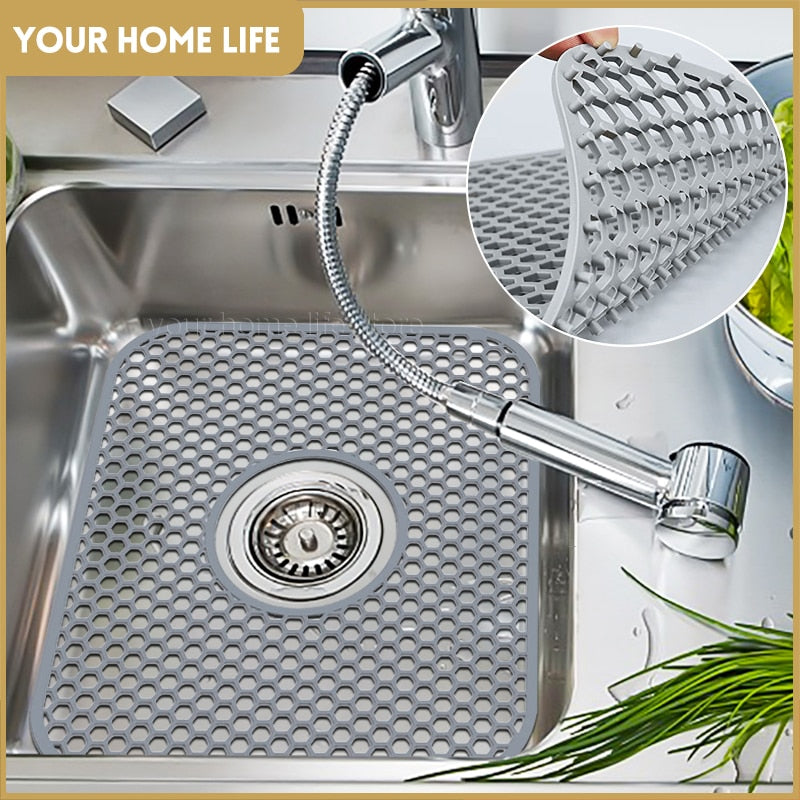 Silicone sink protector mat in stainless steel sink, heat-resistant and durable.