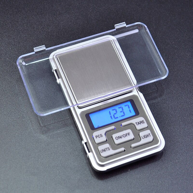High-Precision Portable Handheld Electronic Weighing Jewelry Scale with backlit display and stainless steel platform.