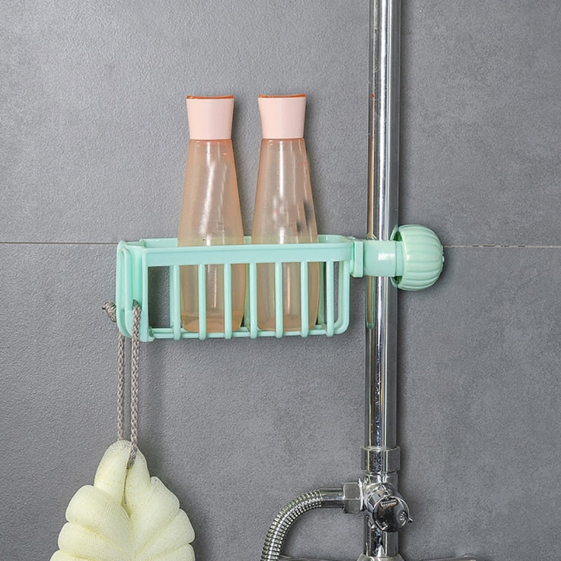 Sink sponge soap cloth drain rack storage organizer in bathroom setting.