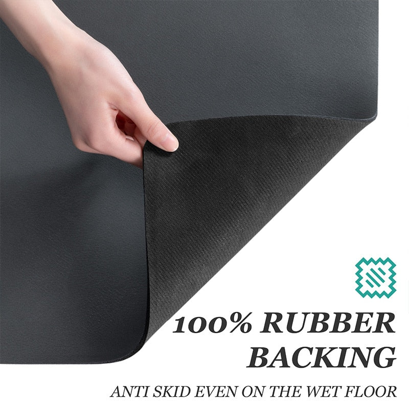 Large kitchen mat with rubber backing for super absorbent draining and drying.