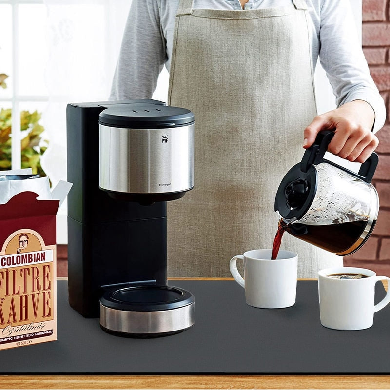 Large Kitchen Super Absorbent Draining Drying Mat on countertop with coffee maker and mugs.